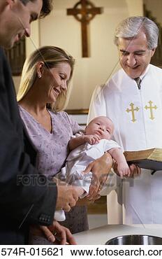 Stock Photography - parents with their 
son at a baptism. 
fotosearch - search 
stock photos, 
pictures, images, 
and photo clipart