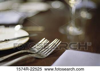 Stock Image - close-up of a 
fork on a dining 
table. fotosearch 
- search stock 
photos, pictures, 
images, and photo 
clipart