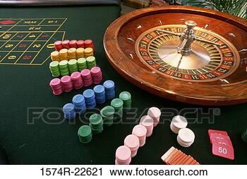 Stock Photography - close-up of a 
roulette wheel 
with gambling 
chips in a casino. 
fotosearch - search 
stock photos, 
pictures, images, 
and photo clipart