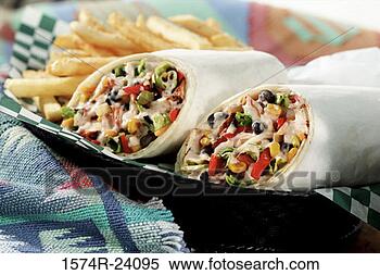 Stock Image - close-up of two 
wrap sandwiches 
with french fries. 
fotosearch - search 
stock photos, 
pictures, images, 
and photo clipart