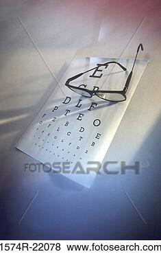 Stock Photo - glasses on an 
eye chart. fotosearch 
- search stock 
photos, pictures, 
images, and photo 
clipart