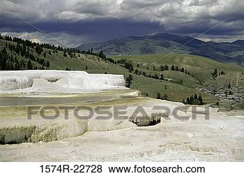 Stock Photo - hilly landscape 
at mammoth hot 
springs,  yellowstone 
national park. 
fotosearch - search 
stock photos, 
pictures, images, 
and photo clipart