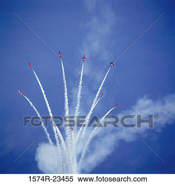 Stock Image - low angle view 
of fighter planes 
performing aerobatics 
in sky,  red. 
fotosearch - search 
stock photos, 
pictures, images, 
and photo clipart