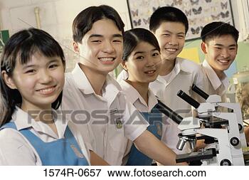 Picture - portrait of teenage 
students in a 
science laboratory. 
fotosearch - search 
stock photos, 
pictures, images, 
and photo clipart
