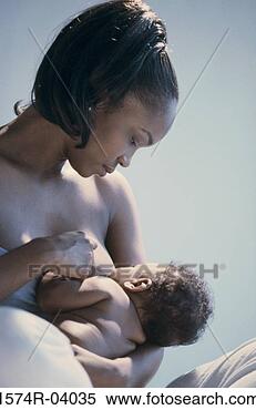 Stock Image - woman breastfeeding 
her baby boy. 
fotosearch - search 
stock photos, 
pictures, images, 
and photo clipart