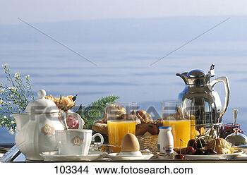 Stock Photo - laied  table for 
breakfast, holiday-style. 
fotosearch - search 
stock photos, 
pictures, images, 
and photo clipart