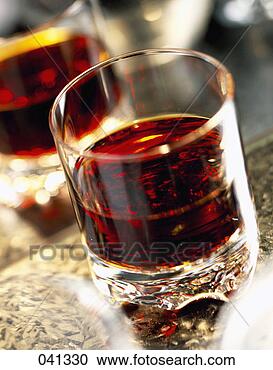 Stock Photography - glass of brandy. 
fotosearch - search 
stock photos, 
pictures, images, 
and photo clipart