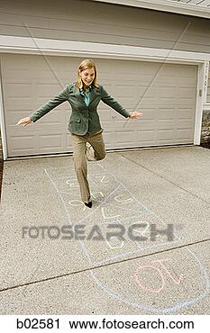 Stock Photography - businesswoman 
playing hopscotch. 
fotosearch - search 
stock photos, 
pictures, wall 
murals, images, 
and photo clipart