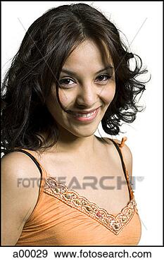 Stock Photograph - portrait of a 
young latin woman 
smiling. fotosearch 
- search stock 
photos, pictures, 
images, and photo 
clipart