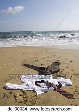 Stock Photo - business attire 
on sandy beach 
no people. fotosearch 
- search stock 
photos, pictures, 
images, and photo 
clipart