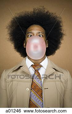 Stock Photo - man with an afro 
in beige suit 
blowing a bubble. 
fotosearch - search 
stock photos, 
pictures, images, 
and photo clipart