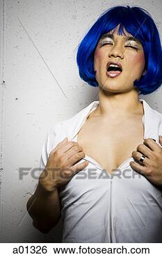 Stock Photo - man in blue wig 
and makeup flirting. 
fotosearch - search 
stock photos, 
pictures, images, 
and photo clipart