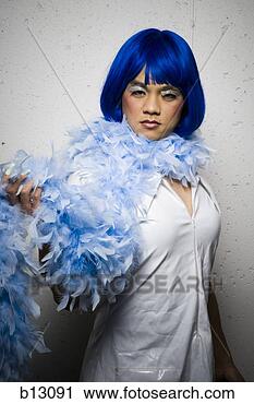 Stock Photography - man in blue wig 
and feather boa 
flirting. fotosearch 
- search stock 
photos, pictures, 
images, and photo 
clipart