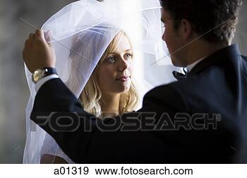 Stock Photograph - newlywed bride 
and groom. fotosearch 
- search stock 
photos, pictures, 
images, and photo 
clipart