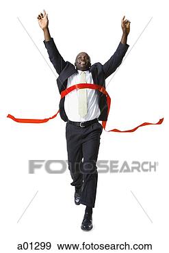 Stock Photograph - a running businessman 
takes first place 
as he crosses 
the finish line. 
fotosearch - search 
stock photos, 
pictures, images, 
and photo clipart