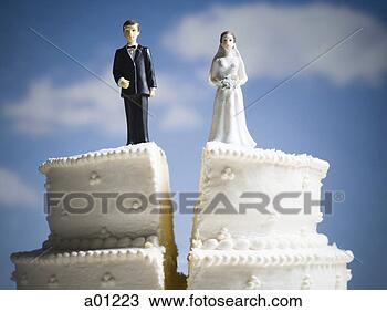 Stock Photo - wedding cake visual 
metaphor with 
figurine cake 
toppers. fotosearch 
- search stock 
photos, pictures, 
images, and photo 
clipart