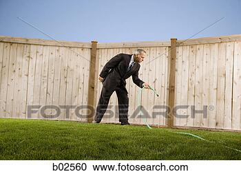 Hazır Fotoğraflar - ucuz,  açi,  yayinlama, 
 işadami,  watering, 
 hortum. fotosearch 
- foto, resim, 
görüntü ve foto 
klipart ara