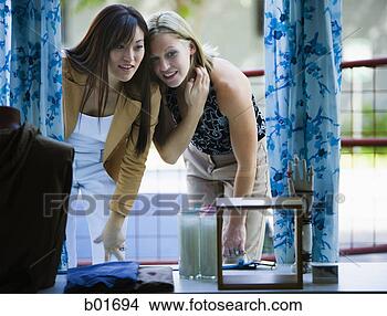 Stock Photo - two young women 
looking at a window 
display. fotosearch 
- search stock 
photos, pictures, 
images, and photo 
clipart