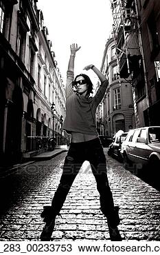 Stock Photo - black and white 
full length front 
view man standing 
on a  cobbled. 
fotosearch - search 
stock photos, 
pictures, images, 
and photo clipart