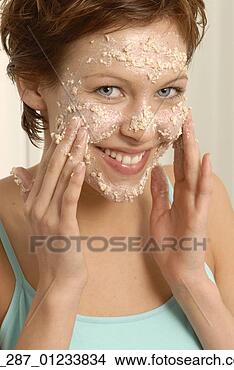 Stock Photo - front view head 
and shoulders 
young woman with 
short hair looking 
at. fotosearch 
- search stock 
photos, pictures, 
images, and photo 
clipart