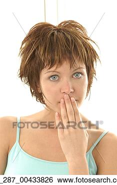 Stock Photo - head and shoulders 
front view young 
woman looking 
at the camera 
wide. fotosearch 
- search stock 
photos, pictures, 
images, and photo 
clipart