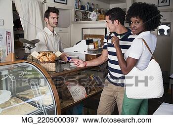 Picture - a young couple 
in their 20's 
or early 30's 
buy pastries at 
a bakery. fotosearch 
- search stock 
photos, pictures, 
images, and photo 
clipart