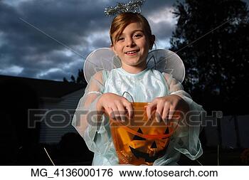 Stock Photo - a young girl out 
on halloween  
she is dressed 
as a fairy princess 
in. fotosearch 
- search stock 
photos, pictures, 
images, and photo 
clipart