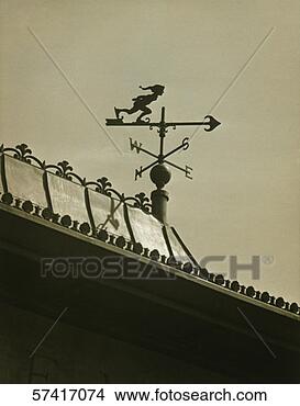 Stock Photo - copper roof top 
with weathervane, 
(b&w), (low angle 
view). fotosearch 
- search stock 
photos, pictures, 
images, and photo 
clipart