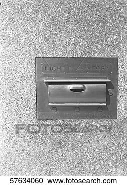 Stock Photography - mailbox on wall, 
(b&w). fotosearch 
- search stock 
photos, pictures, 
images, and photo 
clipart