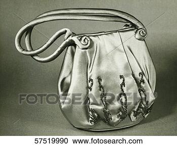 Stock Photography - satin evening 
bag, (b&w), close-up. 
fotosearch - search 
stock photos, 
pictures, images, 
and photo clipart