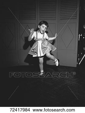 Stock Photo - girl (3-4) dancing, 
(b&w). fotosearch 
- search stock 
photos, pictures, 
images, and photo 
clipart