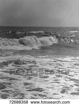 Stock Photo - surf on beach, 
(b&w). fotosearch 
- search stock 
photos, pictures, 
images, and photo 
clipart