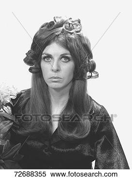 Stock Image - young woman posing 
in studio, (b&w), 
portrait. fotosearch 
- search stock 
photos, pictures, 
images, and photo 
clipart