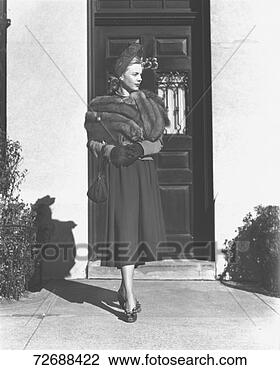 Stock Photo - woman leaving 
house, (b&w). 
fotosearch - search 
stock photos, 
pictures, images, 
and photo clipart