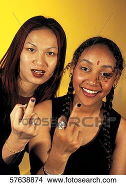 Stock Photo - two young women showing the middle finger to the camera. fotosearch - search stock photos, pictures, images, and photo clipart