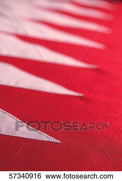 Stock Photo - close-up of the 
flag of bahrain. 
fotosearch - search 
stock photos, 
pictures, images, 
and photo clipart