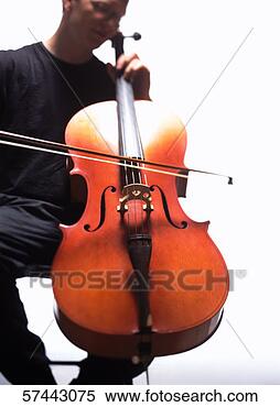 Stock Image - low angle view 
of a man playing 
the cello. fotosearch 
- search stock 
photos, pictures, 
images, and photo 
clipart