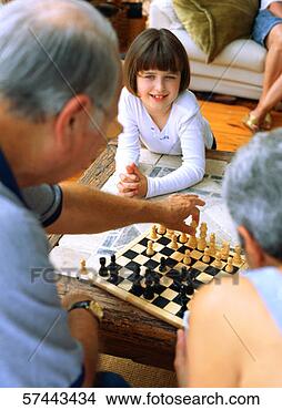 Stock Photo - close-up of a 
boy (6-8) and 
girl (8-10) playing 
chess with their. 
fotosearch - search 
stock photos, 
pictures, images, 
and photo clipart