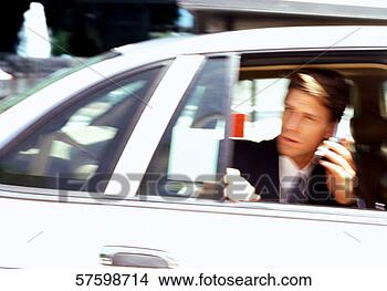 Stock Photo - blurred shot of 
a young man looking 
out the window 
of a car. fotosearch 
- search stock 
photos, pictures, 
images, and photo 
clipart