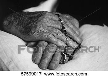 Picture - black and white 
close-up of aged 
hands holding 
a rosary. fotosearch 
- search stock 
photos, pictures, 
images, and photo 
clipart