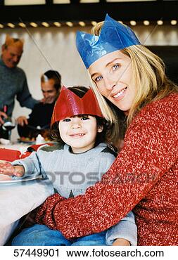 Stock Photography - side profile of 
a mother and daughter 
at a christmas 
party. fotosearch 
- search stock 
photos, pictures, 
images, and photo 
clipart