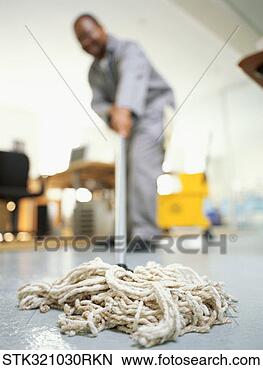 Stock Photo - cleaner cleaning 
floor in an office. 
fotosearch - search 
stock photos, 
pictures, images, 
and photo clipart