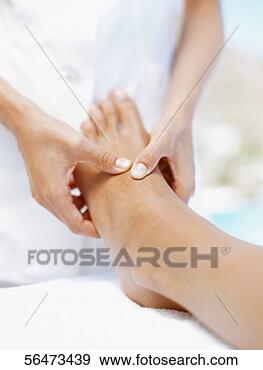 Stock Photograph - low section view 
of a person getting 
a massage from 
a massage. fotosearch 
- search stock 
photos, pictures, 
images, and photo 
clipart