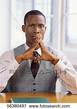 Picture - portrait of a 
businessman with 
a serious facial 
expression. fotosearch 
- search stock 
photos, pictures, 
images, and photo 
clipart