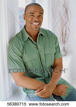 Stock Image - portrait of a 
mid adult man 
smiling. fotosearch 
- search stock 
photos, pictures, 
images, and photo 
clipart