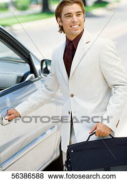 Stock Photo - businessman opening 
the door of a 
car. fotosearch 
- search stock 
photos, pictures, 
images, and photo 
clipart
