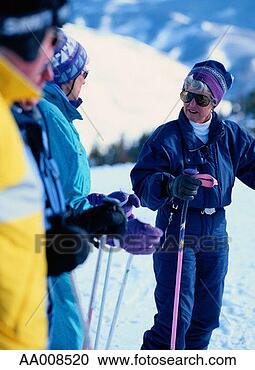 Stock Photography - three downhill 
skiers. fotosearch 
- search stock 
photos, pictures, 
images, and photo 
clipart