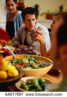 Picture - man listening 
to a woman talking 
at a party. fotosearch 
- search stock 
photos, pictures, 
images, and photo 
clipart