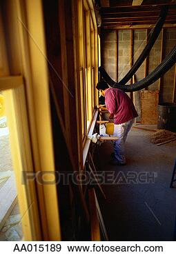 Stock Photograph - man painting a 
window frame. 
fotosearch - search 
stock photos, 
pictures, images, 
and photo clipart