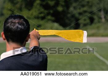 Stock Photography - referee waving 
the yellow flag. 
fotosearch - search 
stock photos, 
pictures, images, 
and photo clipart
